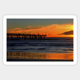 The pier at sunset Sticker